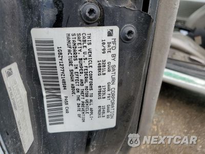 Zdjęcie 12 z 14 samochodu: 2000 SATURN SC2 VIN:1G8ZY1277YZ148504 - miniatura