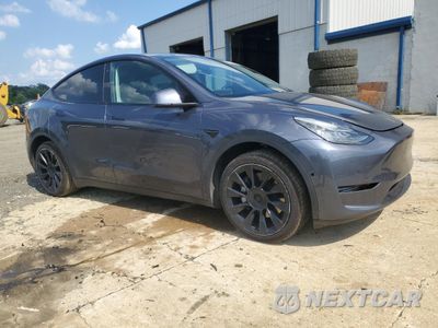 Czwarte zdjęcie samochodu z boku: 2022 TESLA MODEL Y VIN:7SAYGDEE3NF440185 - miniatura