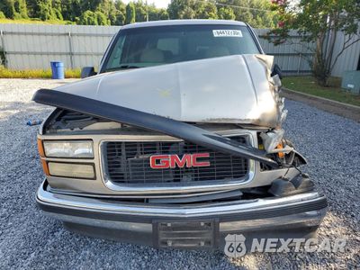 Piąte zdjęcie samochodu w środku: 1999 GMC SUBURBAN C1500 VIN:3GKEC16R7XG541100 - miniatura