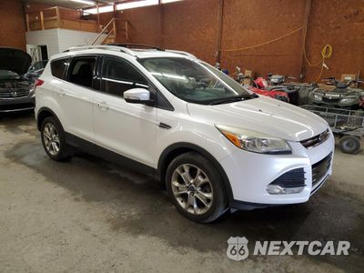 Czwarte zdjęcie samochodu z boku: 2015 FORD ESCAPE TITANIUM VIN:1FMCU9J98FUA47860 - miniatura