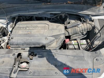 Zdjęcie 12 z 13 samochodu: 2004 HONDA PILOT EX VIN:2HKYF18434H541437 - miniatura