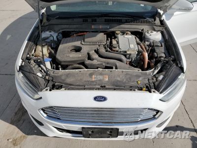 Zdjęcie 11 z 12 samochodu: 2014 FORD FUSION SE PHEV VIN:3FA6P0PU7ER397718 - miniatura