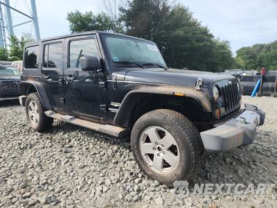 Czwarte zdjęcie samochodu z boku: 2011 JEEP WRANGLER UNLIMITED SAHARA VIN:1J4HA5H11BL519483 - miniatura