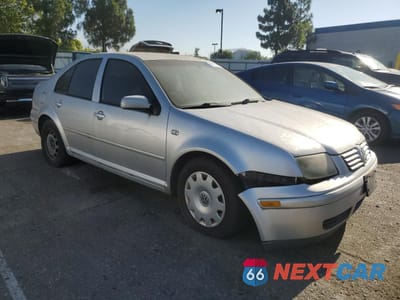 Czwarte zdjęcie samochodu z boku: 2001 VOLKSWAGEN JETTA GL VIN:3VWRT29M61M031068 - miniatura