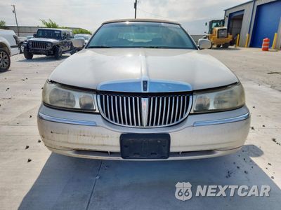 Piąte zdjęcie samochodu w środku: 1999 LINCOLN TOWN CAR CARTIER VIN:1LNHM83W0XY607285 - miniatura
