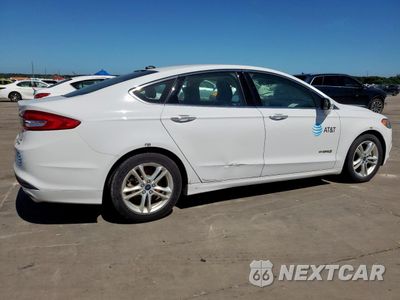 Trzecie zdjęcie samochodu z tyłu: 2018 FORD FUSION SE HYBRID VIN:3FA6P0LU1JR171657 - miniatura