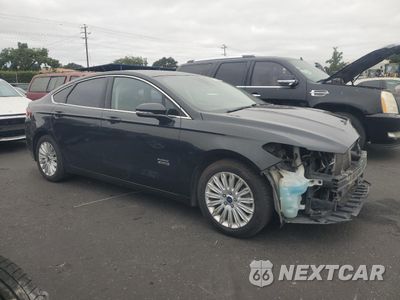 Czwarte zdjęcie samochodu z boku: 2015 FORD FUSION SE PHEV VIN:3FA6P0PU1FR284591 - miniatura