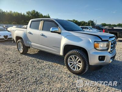 Czwarte zdjęcie samochodu z boku: 2017 GMC CANYON SLT VIN:1GTG6DEN3H1276364 - miniatura