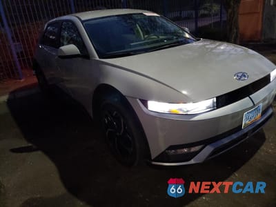 Czwarte zdjęcie samochodu z boku: 2022 HYUNDAI IONIQ 5 SE VIN:KM8KMDAF5NU054445 - miniatura