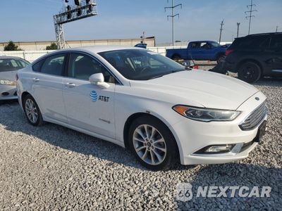 Czwarte zdjęcie samochodu z boku: 2017 FORD FUSION SE HYBRID VIN:3FA6P0LU3HR400737 - miniatura