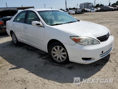 Czwarte zdjęcie samochodu z boku: 2003 TOYOTA CAMRY LE VIN:JTDBE32K830176776 - miniatura
