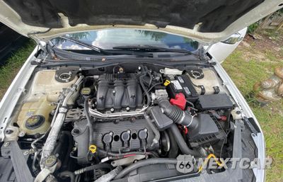 Zdjęcie 7 z 10 samochodu: 2011 FORD FUSION SEL VIN:3FAHP0JG6BR187909 - miniatura