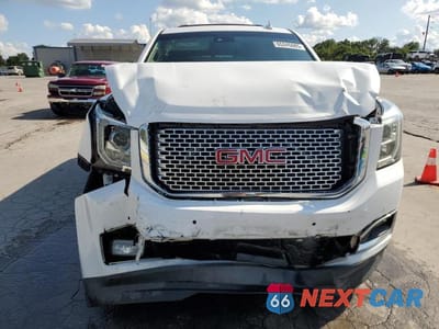 Piąte zdjęcie samochodu w środku: 2016 GMC YUKON DENALI VIN:1GKS2CKJ1GR379174 - miniatura
