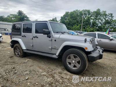 Czwarte zdjęcie samochodu z boku: 2013 JEEP WRANGLER UNLIMITED SPORT VIN:1C4HJWDG9DL617055 - miniatura