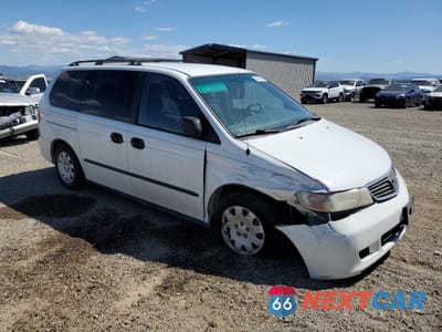 Czwarte zdjęcie samochodu z boku: 2001 HONDA ODYSSEY LX VIN:2HKRL18561H529123 - miniatura
