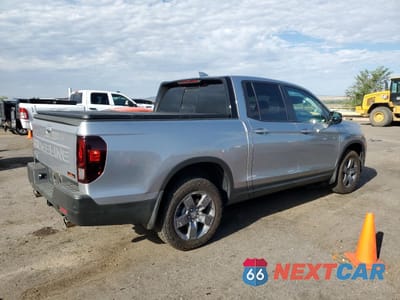 Trzecie zdjęcie samochodu z tyłu: 2024 HONDA RIDGELINE TRAIL SPORT VIN:5FPYK3F66RB019099 - miniatura
