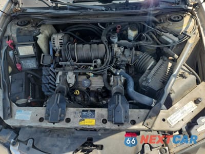 Zdjęcie 11 z 14 samochodu: 2000 CHEVROLET IMPALA VIN:2G1WF55K6Y9119567 - miniatura