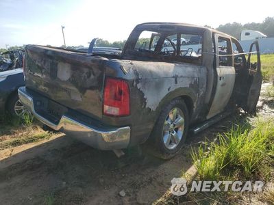Trzecie zdjęcie samochodu z tyłu: 2016 RAM 1500 SLT VIN:1C6RR6LG4GS404627 - miniatura