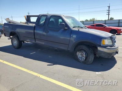 Czwarte zdjęcie samochodu z boku: 2000 FORD F150 VIN:2FTRX18W1YCB03806 - miniatura
