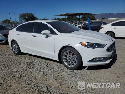 Czwarte zdjęcie samochodu z boku: 2017 FORD FUSION SE HYBRID VIN:3FA6P0LU6HR409710 - miniatura