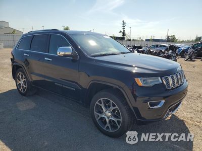 Czwarte zdjęcie samochodu z boku: 2019 JEEP GRAND CHEROKEE OVERLAND VIN:1C4RJFCG3KC583875 - miniatura