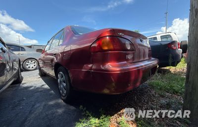 Trzecie zdjęcie samochodu z tyłu: 2002 TOYOTA COROLLA CE VIN:2T1BR12E42C571352 - miniatura