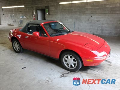 Czwarte zdjęcie samochodu z boku: 1993 MAZDA MX-5 MIATA VIN:JM1NA3519P0401899 - miniatura
