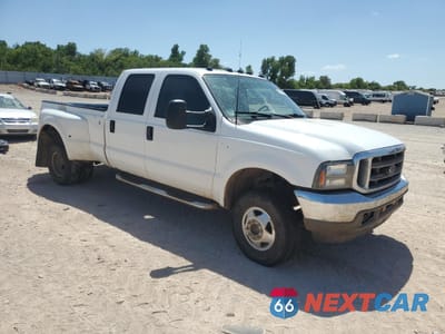 Czwarte zdjęcie samochodu z boku: 2001 FORD F350 SUPER DUTY VIN:1FTWW33F41EC65874 - miniatura