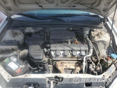 Zdjęcie 11 z 14 samochodu: 2002 HONDA CIVIC EX VIN:1HGEM22932L110531 - miniatura