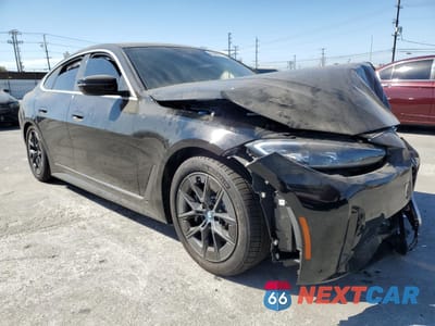 Czwarte zdjęcie samochodu z boku: 2023 BMW I4 EDRIVE 35 VIN:WBY43AW05PFR31699 - miniatura