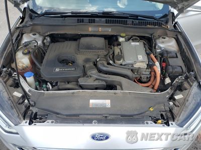 Zdjęcie 11 z 14 samochodu: 2017 FORD FUSION TITANIUM HEV VIN:3FA6P0RU8HR279971 - miniatura