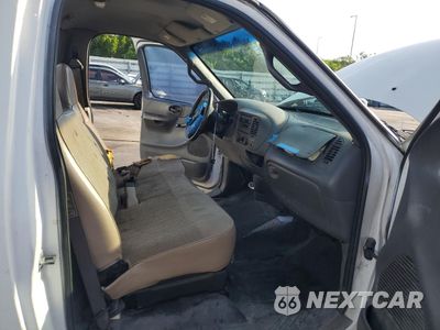 Zdjęcie 10 z 14 samochodu: 2002 FORD F150 VIN:1FTRF17242KA57215 - miniatura
