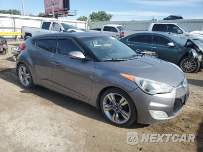 Czwarte zdjęcie samochodu z boku: 2012 HYUNDAI VELOSTER VIN:KMHTC6AD0CU077629 - miniatura