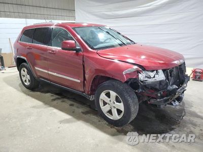 Czwarte zdjęcie samochodu z boku: 2012 JEEP GRAND CHEROKEE LAREDO VIN:1C4RJFAT9CC211748 - miniatura