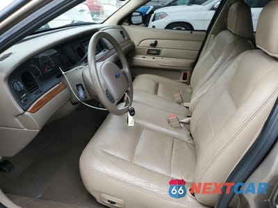 Zdjęcie 7 z 12 samochodu: 2004 FORD CROWN VICTORIA LX VIN:2FAFP74W34X118845 - miniatura