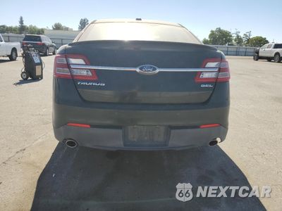 Zdjęcie 6 z 12 samochodu: 2014 FORD TAURUS SEL VIN:1FAHP2E87EG131505 - miniatura