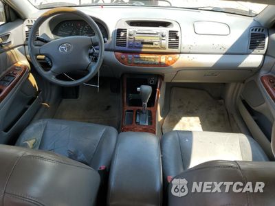 Zdjęcie 8 z 12 samochodu: 2002 TOYOTA CAMRY LE VIN:4T1BF30K72U513151 - miniatura