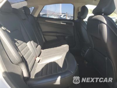 Zdjęcie 10 z 13 samochodu: 2017 FORD FUSION SE HYBRID VIN:3FA6P0LU6HR409710 - miniatura