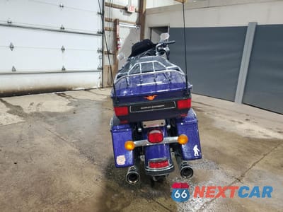 Czwarte zdjęcie samochodu z boku: 2012 HARLEY-DAVIDSON FLHTK ELECTRA GLIDE ULTRA LIMITED VIN:1HD1KEM17CB660557 - miniatura