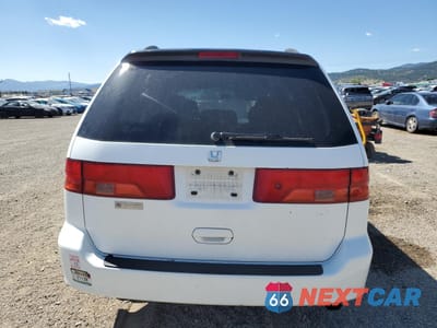 Zdjęcie 6 z 15 samochodu: 2001 HONDA ODYSSEY LX VIN:2HKRL18561H529123 - miniatura