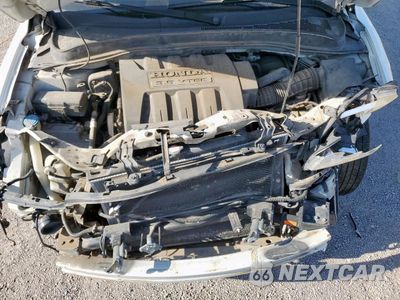 Zdjęcie 12 z 13 samochodu: 2005 HONDA PILOT EX VIN:2HKYF18445H507217 - miniatura