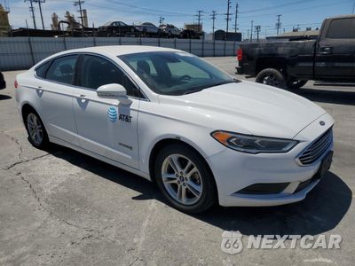 Czwarte zdjęcie samochodu z boku: 2018 FORD FUSION SE HYBRID VIN:3FA6P0LU1JR129960 - miniatura