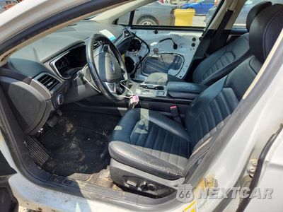 Zdjęcie 7 z 12 samochodu: 2018 FORD FUSION SE HYBRID VIN:3FA6P0LU0JR129920 - miniatura