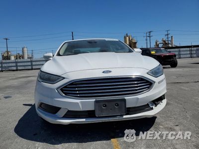 Piąte zdjęcie samochodu w środku: 2018 FORD FUSION SE HYBRID VIN:3FA6P0LU7JR171615 - miniatura
