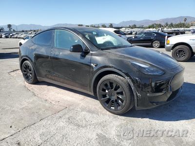 Czwarte zdjęcie samochodu z boku: 2023 TESLA MODEL Y VIN:7SAYGAEE3PF834464 - miniatura