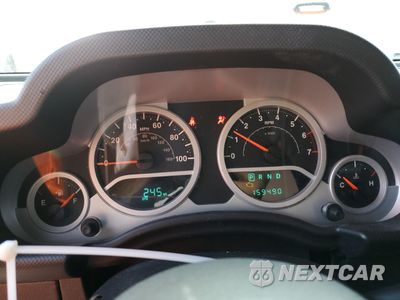 Zdjęcie 9 z 14 samochodu: 2010 JEEP WRANGLER SPORT VIN:1J4AA2D13AL196574 - miniatura