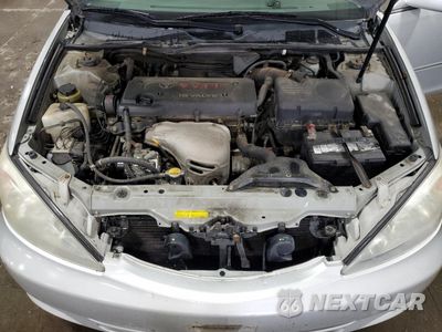 Zdjęcie 11 z 12 samochodu: 2003 TOYOTA CAMRY LE VIN:4T1BE30K83U655898 - miniatura