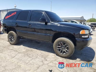Czwarte zdjęcie samochodu z boku: 2004 GMC YUKON VIN:1GKEC13V44R246842 - miniatura