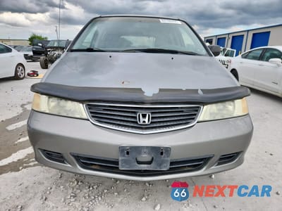 Piąte zdjęcie samochodu w środku: 2001 HONDA ODYSSEY LX VIN:2HKRL185X1H563131 - miniatura