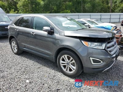 Czwarte zdjęcie samochodu z boku: 2017 FORD EDGE SEL VIN:2FMPK4J82HBB02815 - miniatura